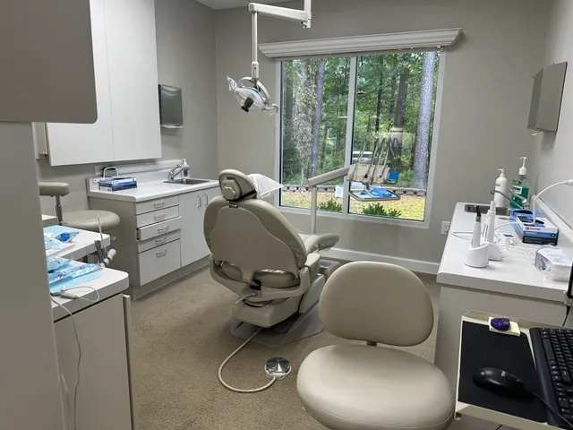 Modern dental operatory with advanced equipment and natural views