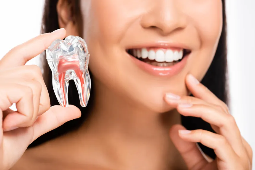 Diagram of root canal treatment saving a natural tooth